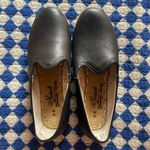 Sabah black leather slip on. Size 38